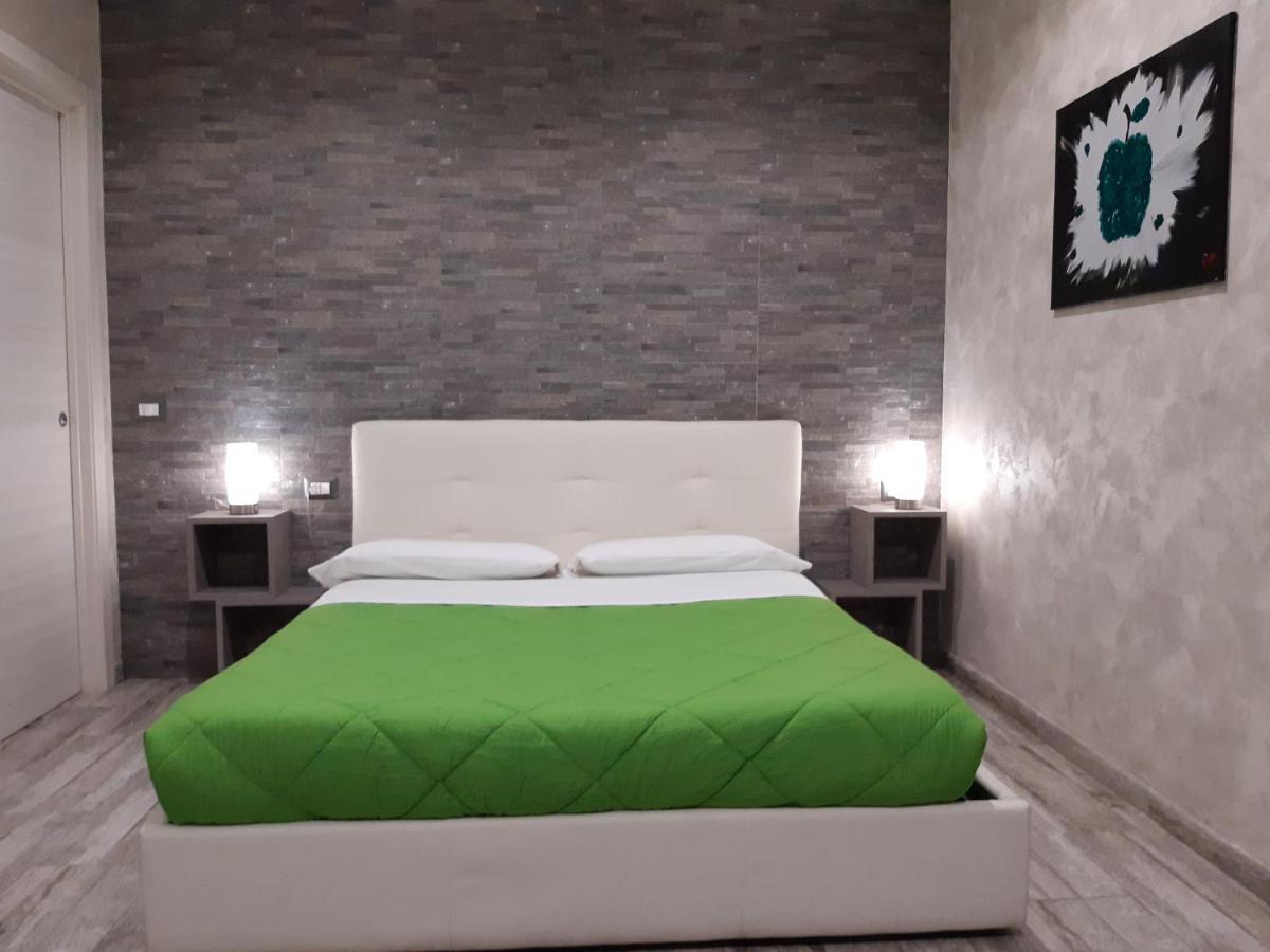 Apple Rooms Rome Airport Fiumicino Exterior foto A bedroom
